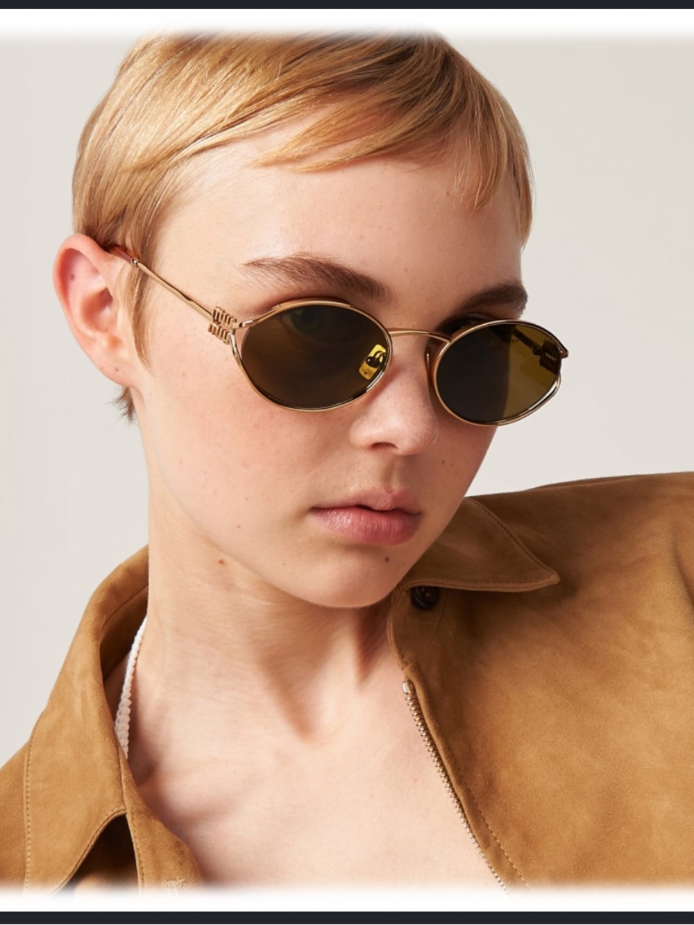 Miu Miu Gold Metal Oval Sunglasses